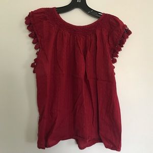 Red shirt with tassels